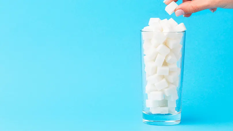 How-does-sugar-affect-the-body_glass-full-of-sugar-cubes