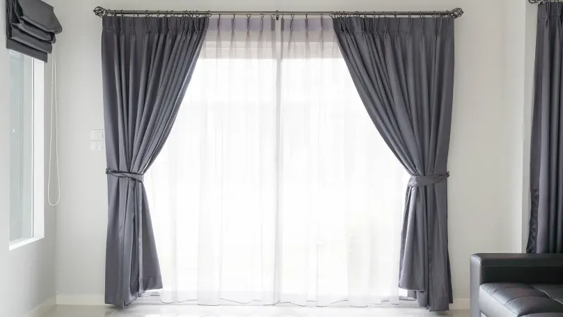 Black curtains in a room